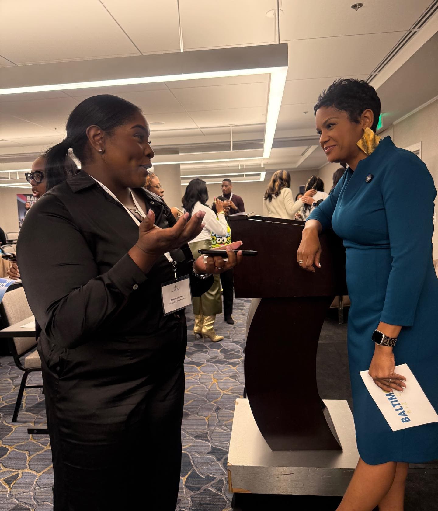 Women entrepreneurs networking at an event captured by Women Winning Worldwide event coverage team