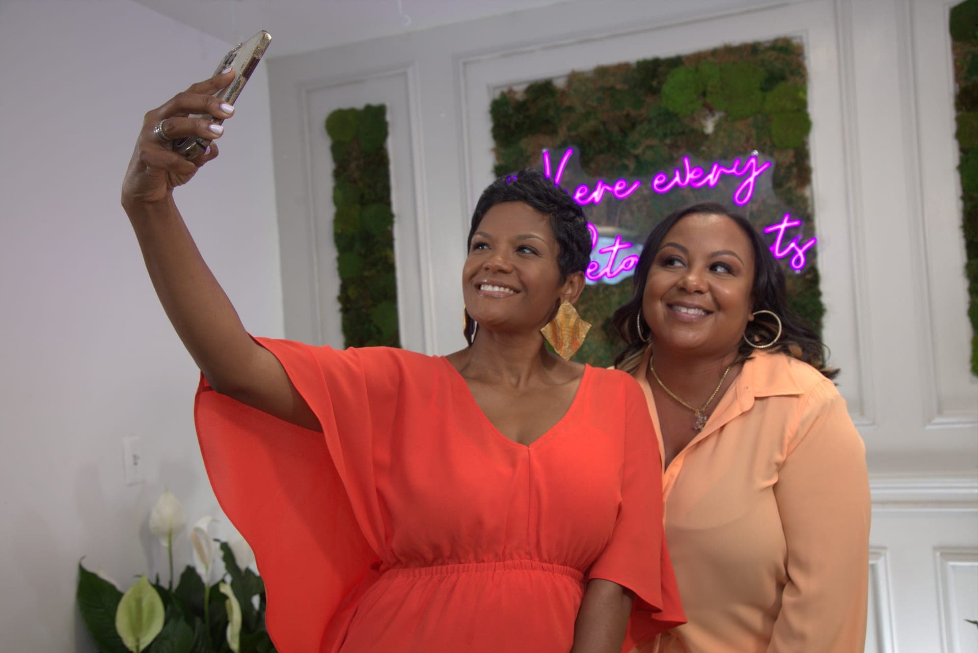 Women entrepreneurs at a professional media session — Women Winning Worldwide brand photography and video production